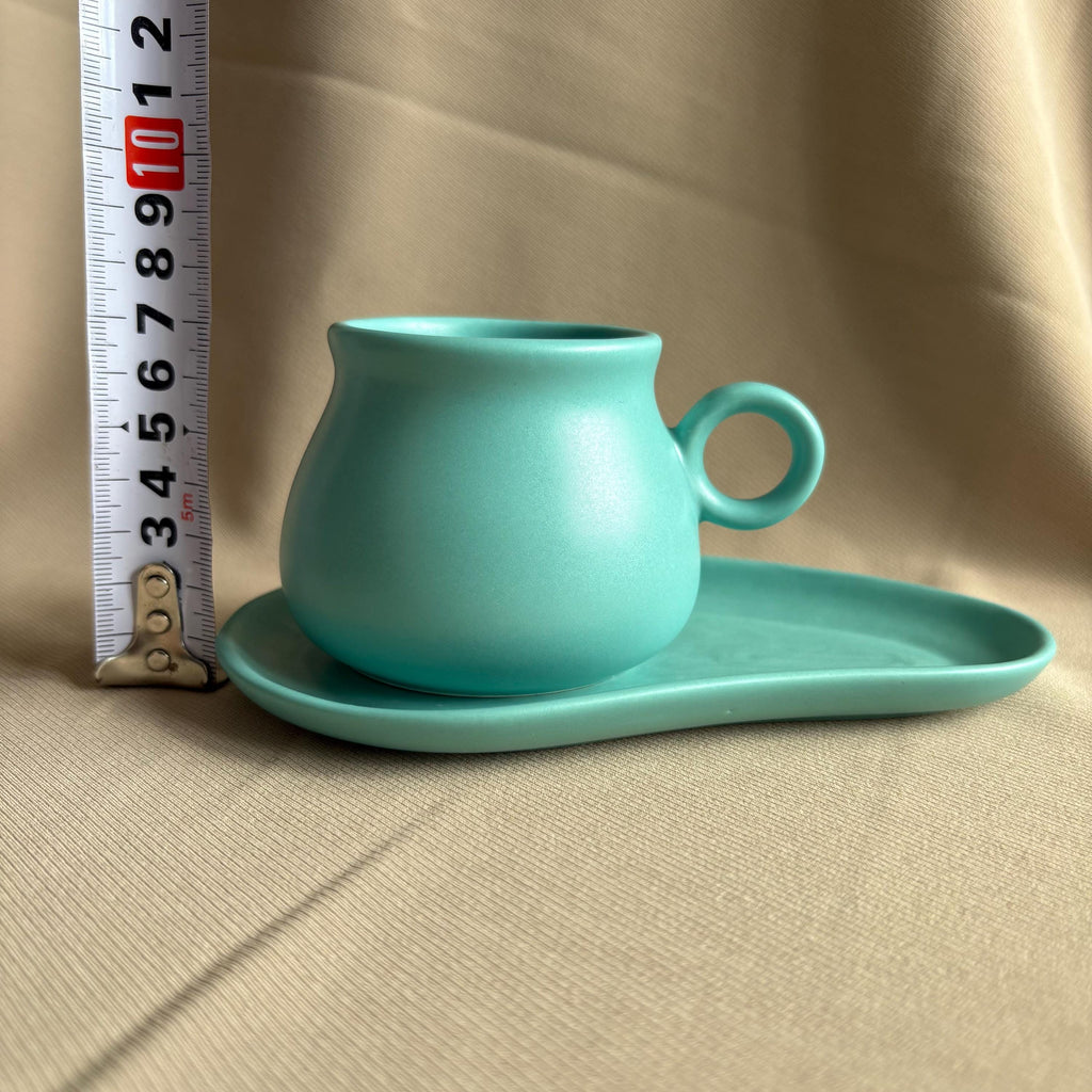 Turquoise Glaze Tea Cup and Saucer