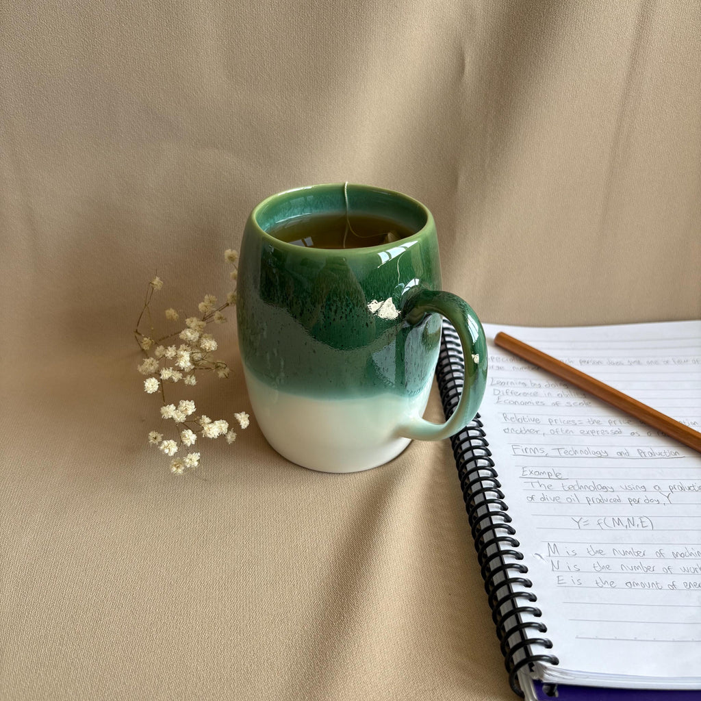Dark Green & White Drip Glaze Stoneware Mug with contoured handle and grey drip glaze pattern.