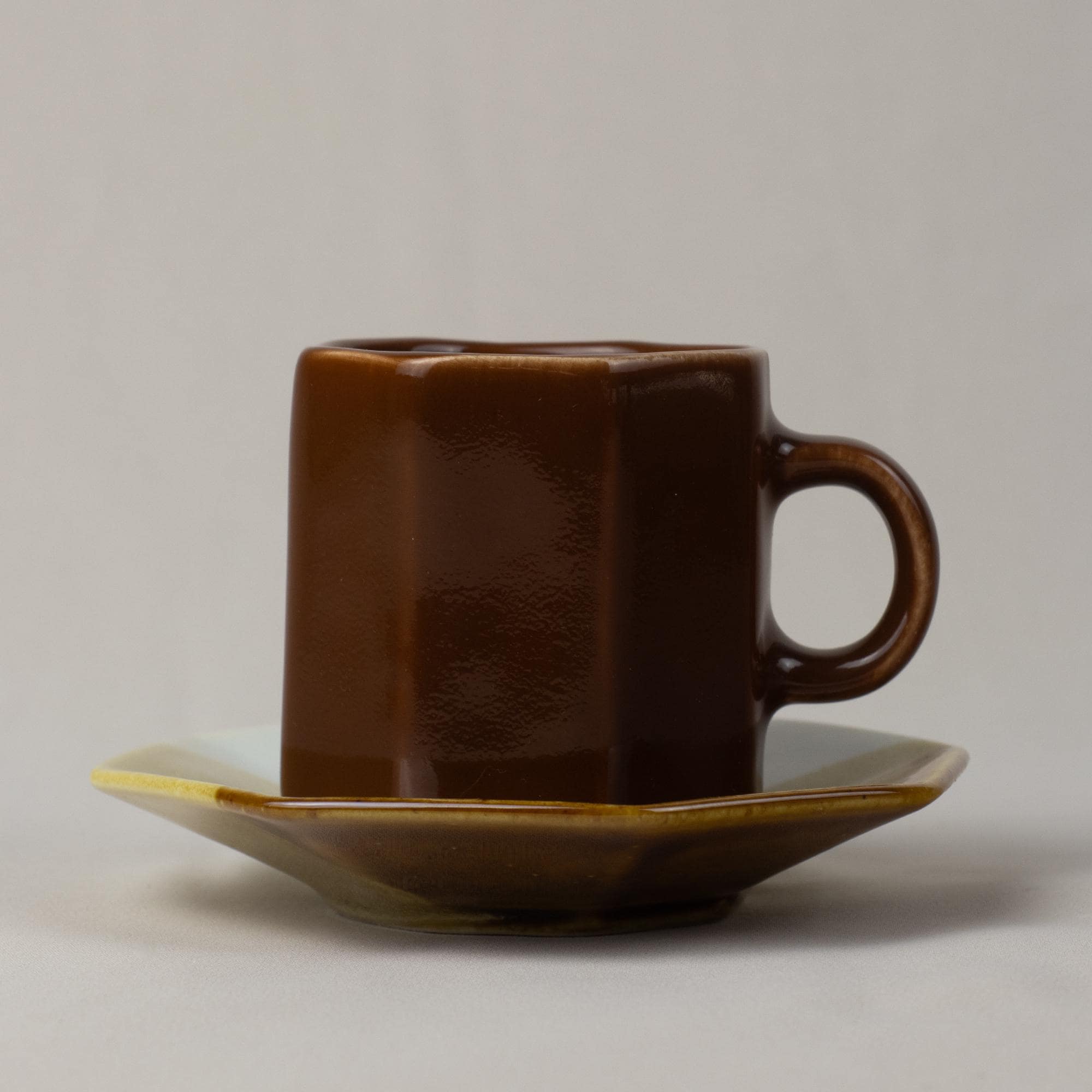 Brown Stoneware Cup and Saucer Set
