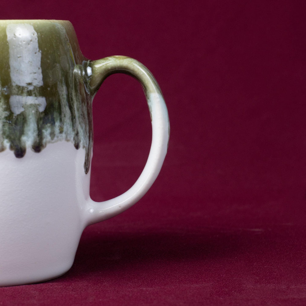 Grey & White Drip Glaze Stoneware Mug showcasing unique drip glaze and ergonomic handle.