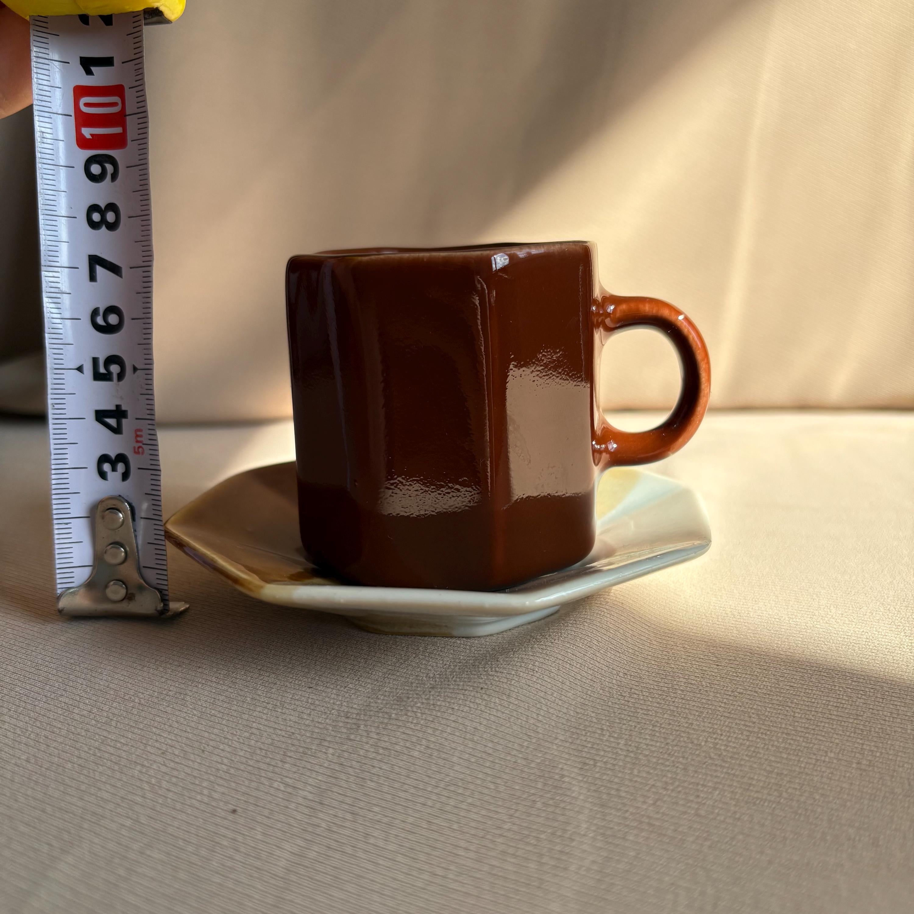 Brown Stoneware Cup and Saucer Set